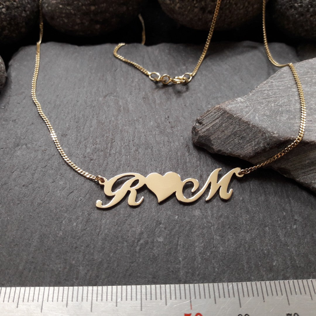 Personalisierte Buchstabenkette mit Herz aus 333er Gelbgold (NK10/8GG)