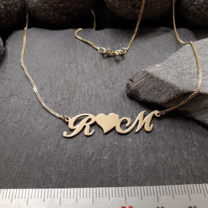 Personalisierte Buchstabenkette mit Herz aus 333er Gelbgold (NK10/8GG)