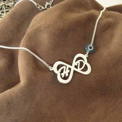 Personalisierte Unendlich-Symbolkette mit zwei Großbuchstaben aus 925er Silber & Nazar Glücksauge (NK33-hb)