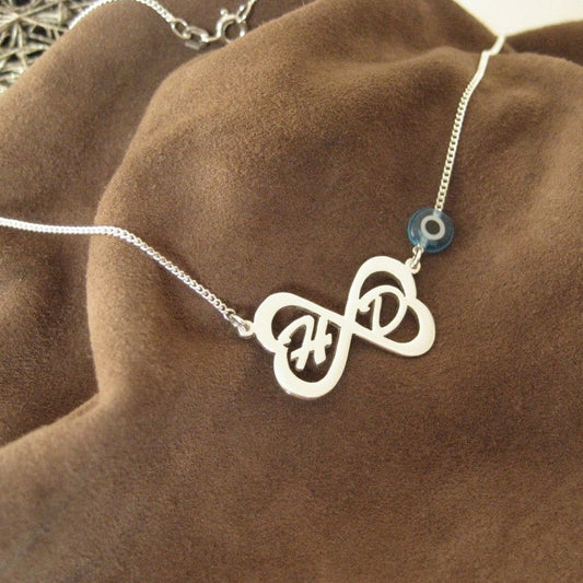 Personalisierte Unendlich-Symbolkette mit zwei Großbuchstaben aus 925er Silber & Nazar Glücksauge (NK33-hb)